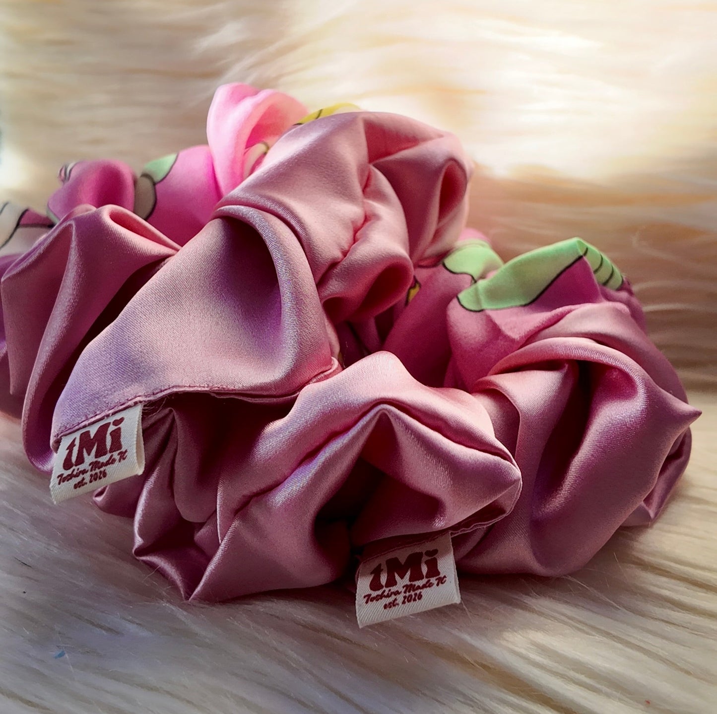 Pink scrunchie with green accents